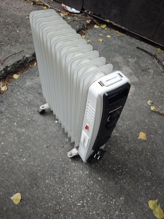 Calorifer electric cu ulei Heinner, 220v, 2900w,12 elemenți,functional