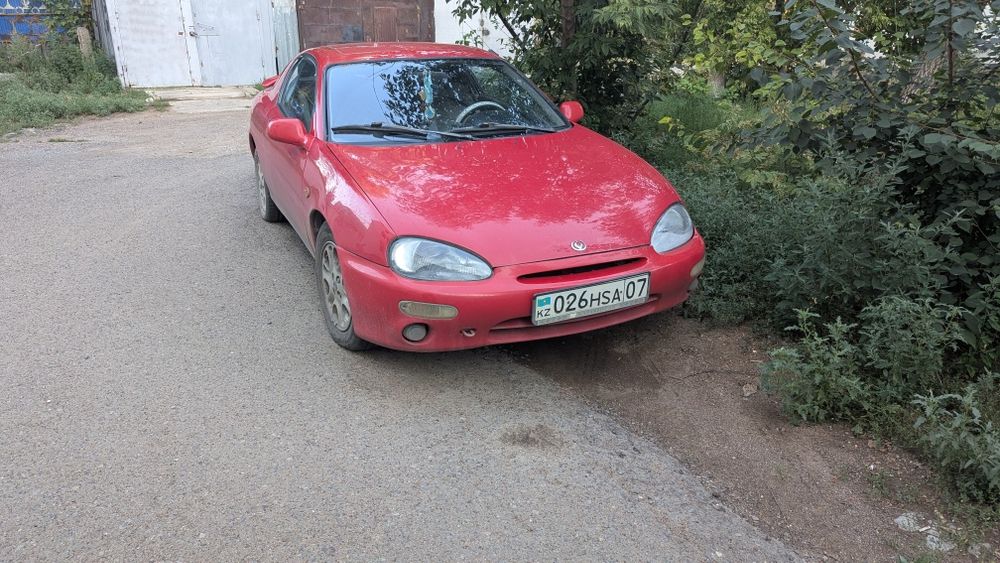 Машина (автомобиль) Mazda MX3 1992