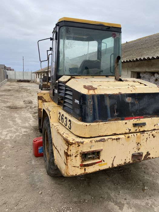 Incarcator frontal zepelin  zl 100