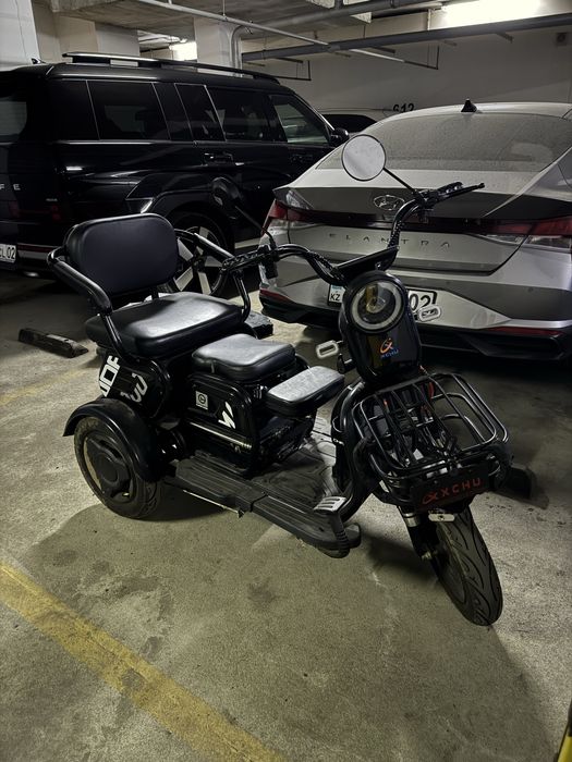 Электроскутер трицикл