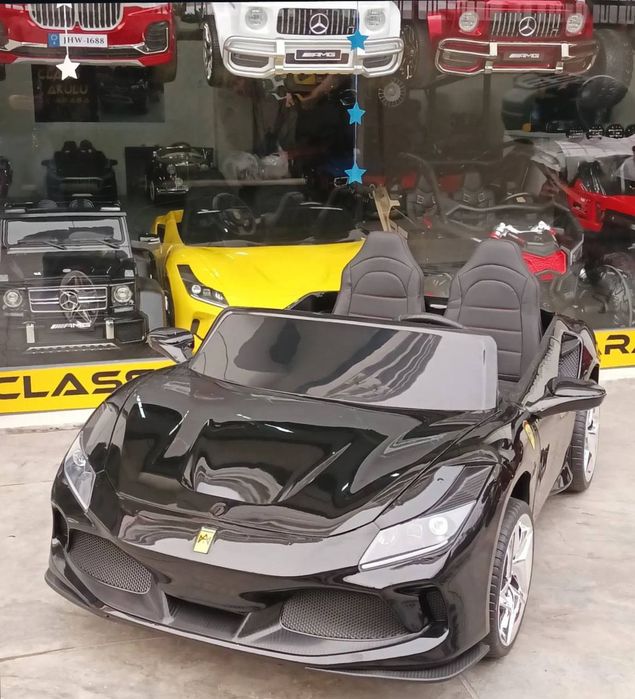 Икки у́риндикли энг катта Ferrari F8 болалар машинаси