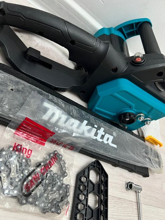 Электрическая цепная пила фирмы Makita