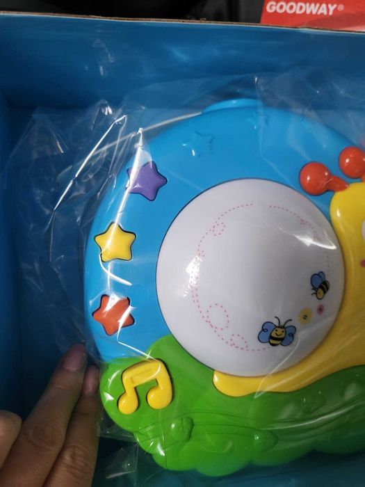 Proiector pentru bebelusi/copii melc cu muzica, lumini si sunete