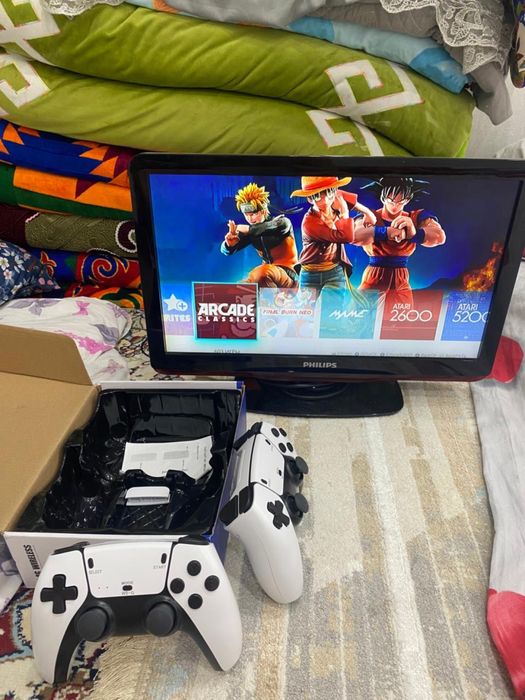 Продам приставку Game Stick pro 4K С телевизором