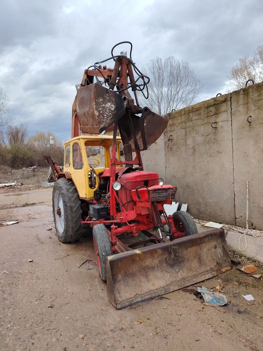 ЮМЗ с грайферен устройство