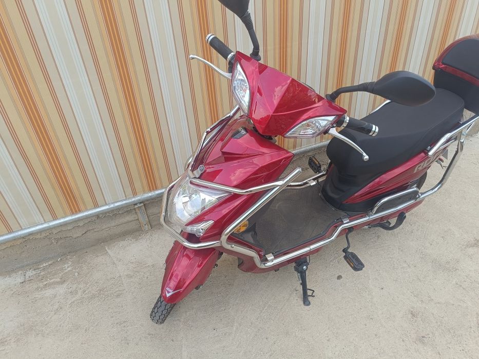 Motoscuter Electric ca nou(inca in folie)