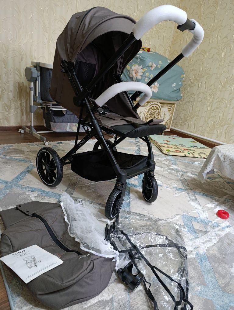 Продам новую коляску в упаковке Tomix Kelly!