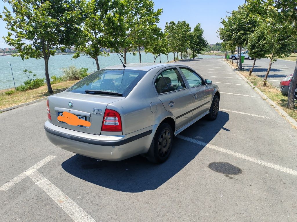 Skoda Octavia impecabila 2009 benzina 1.6 stare că noua 2750 e.