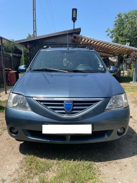Dacia Logan, 1.6 16V • 2006 • 165.000 KM • Albastru • Navigație