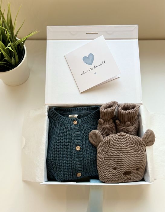 Подаръчни кутии и гардеробчета за новородени