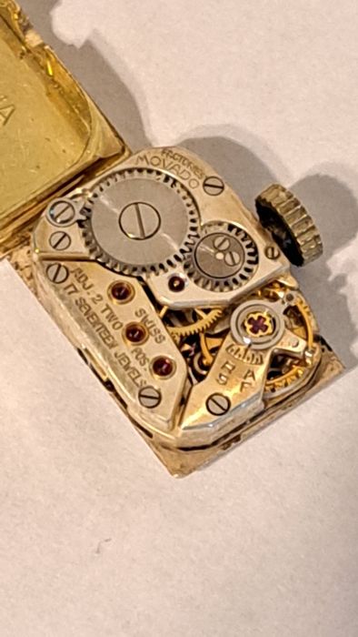 Mecanism plus capac de Aur 18 K Movado