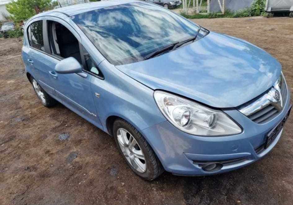 Dezmembrez Opel Corsa D motor cutie usa stop far radiator injector