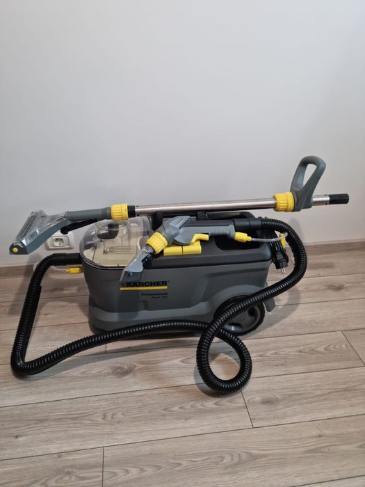Aspirator cu injectie-extractie si aparat de curatat cu abur