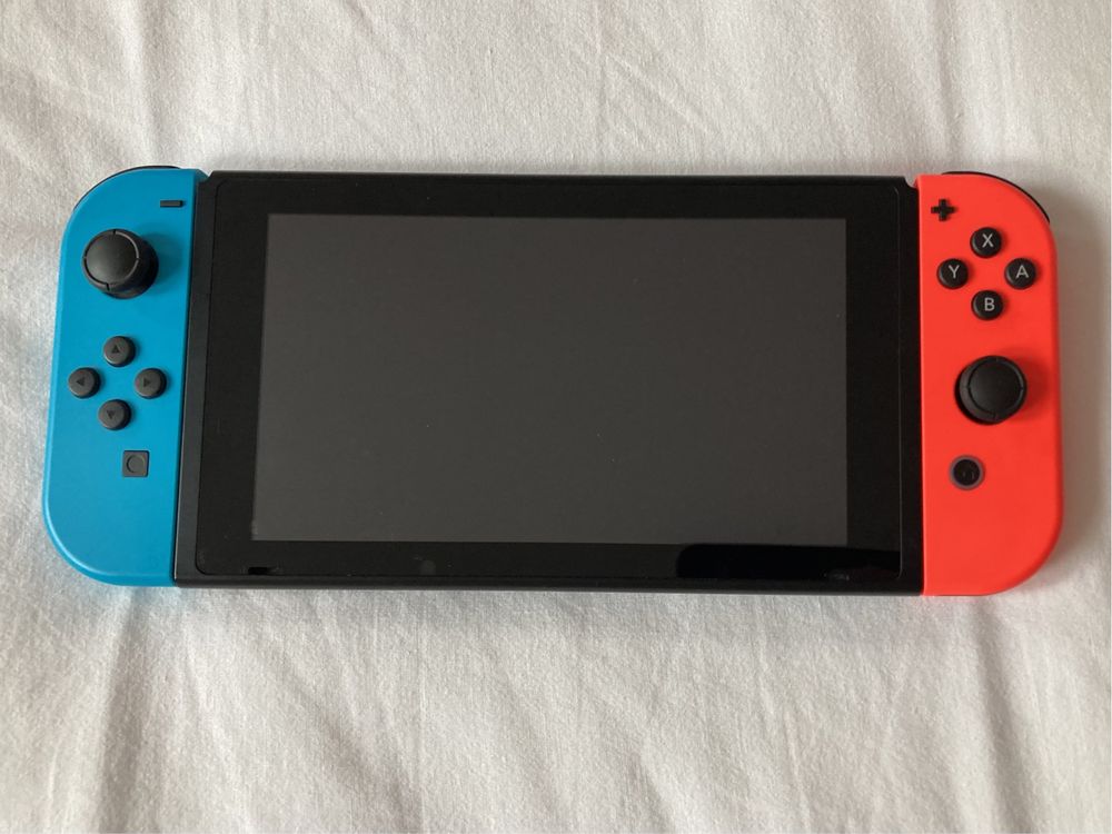 Nintendo Switch + accesorii și jocuri