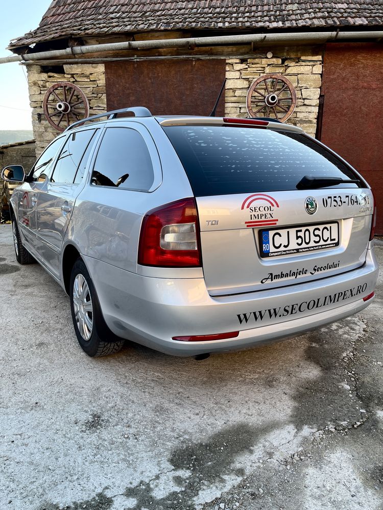 Skoda Octavia 2 Facelift 1.6TDI//Climatronic//Audio Sistem//Comenzi