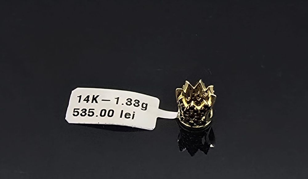 Charm aur 14k 1.33gr