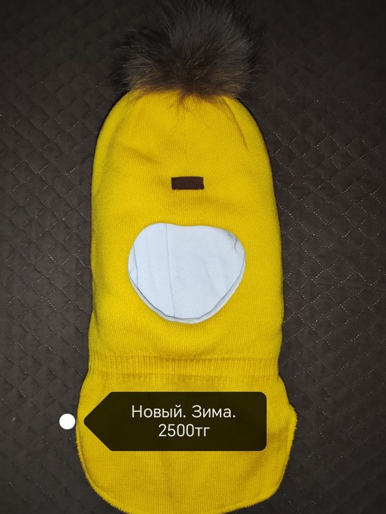 Продам новую зимнюю шапку детскую
