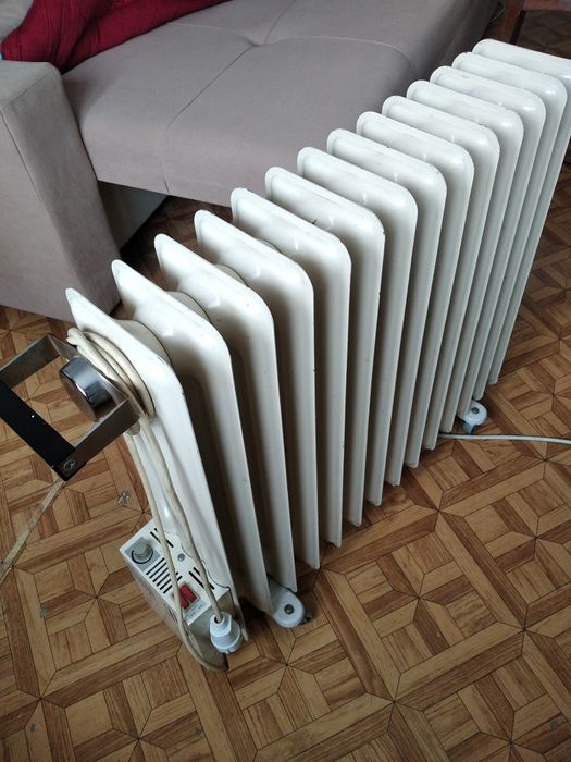Масляная батарея 14 секций. Отлично работает.