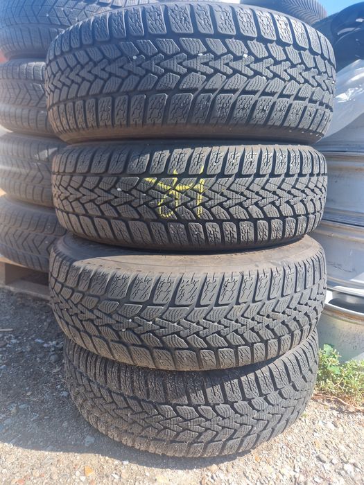 Jante R15 5x112 cu anvelope de iarnă și capace