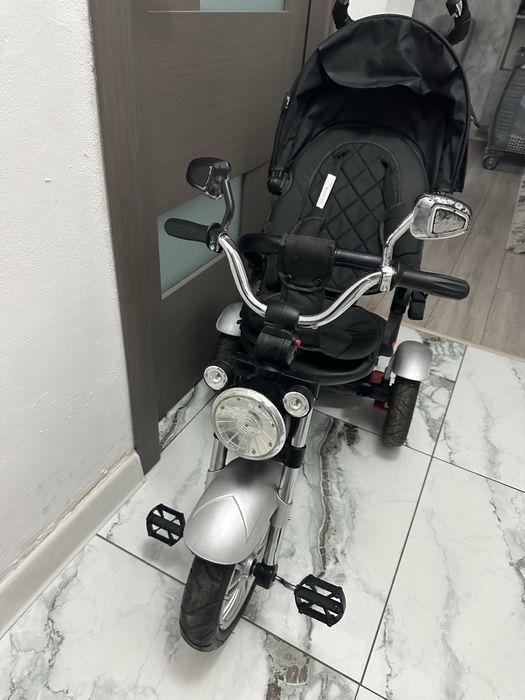 Vand tricicleta cu scaun reversibil Still 6-36 luni , cu pozitie somn