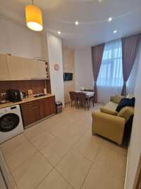 Vand  schimb  cu teren + -  Apartament 2 camere  + loc de parcare in f