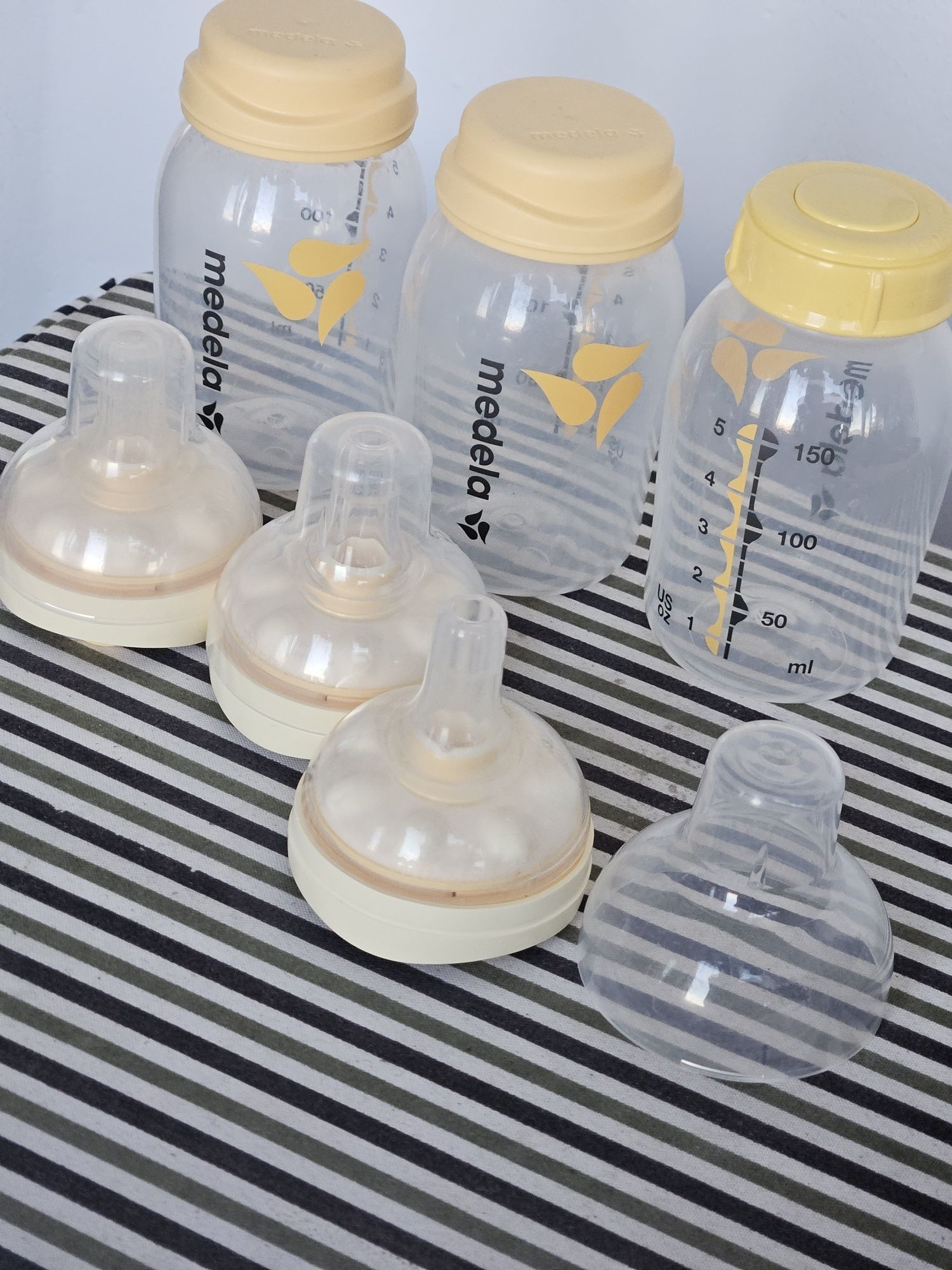 Medela recipient + tetina Calma BONUS pungi stocare