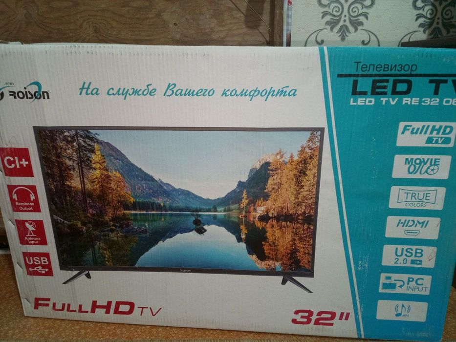 Настенная и удобный настольный телевизор  Roison.