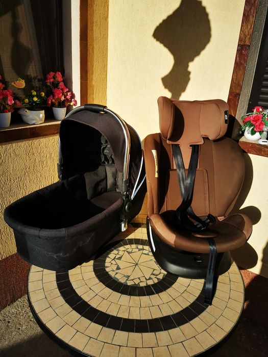 Vand scaun auto rotativ scoică in stare foarte bună