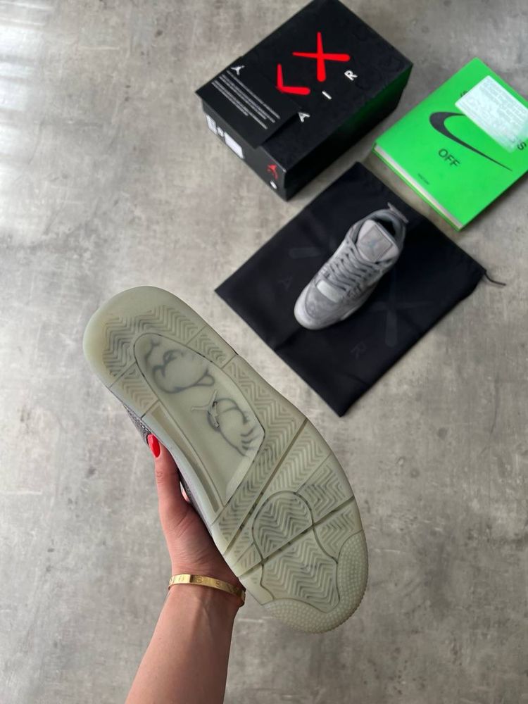 Air Jordan 4 Retro x KAWS “Cool Grey”