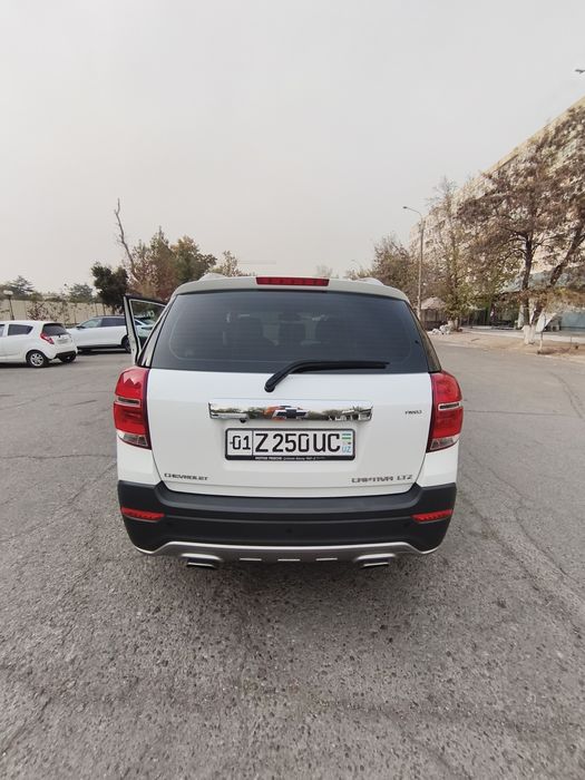 Продам Автомобиль Chevrolet Captiva белый жемчуг 2015 года выпуска