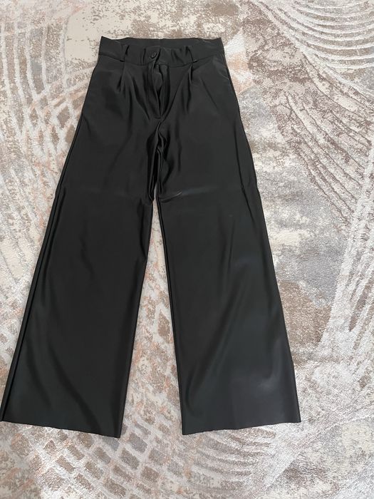 Кожанные брюки широкие