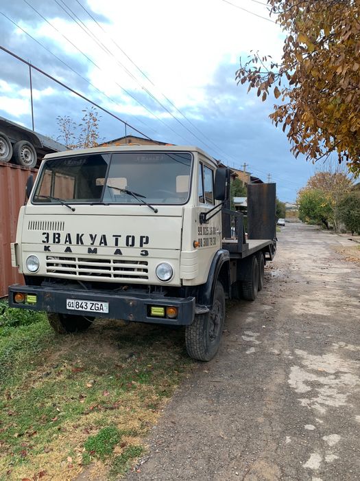 Услуги Эвакуватор перевозка кара экскаватор каток трал  трейлер