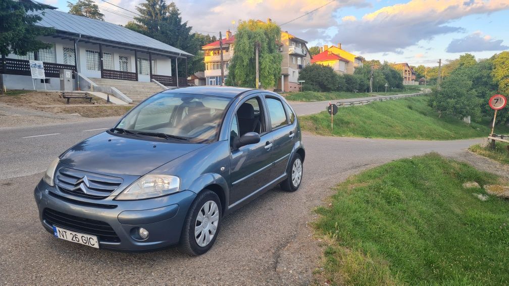 Citroen C3 model exclusive an 2009 1.4 diesel  comenzi volan consum mi