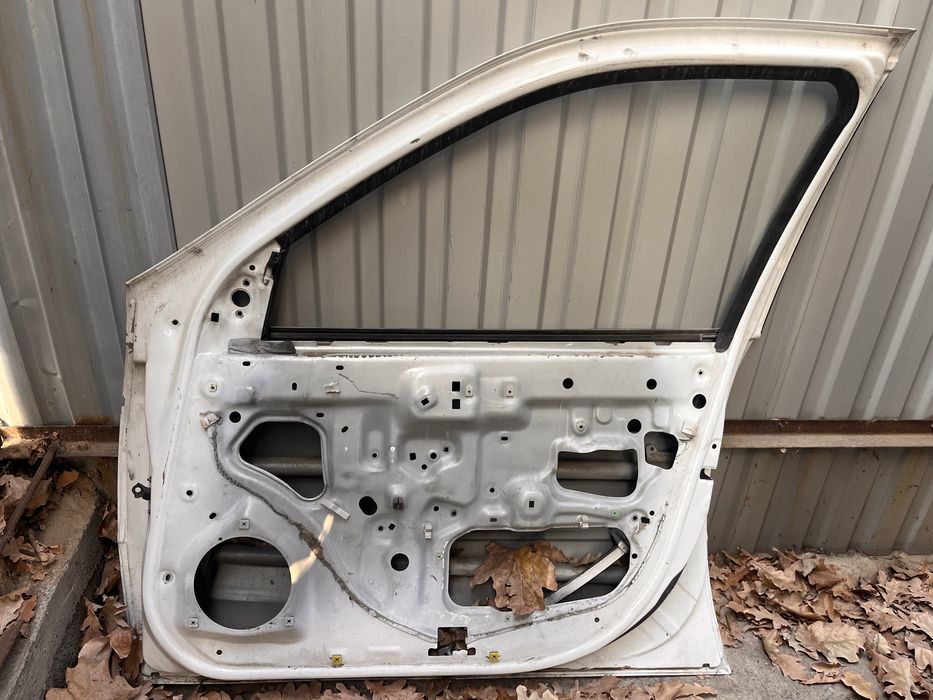 Дверь камри 25