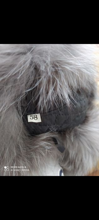 Продам кожаную шапку ушанку с хвостом