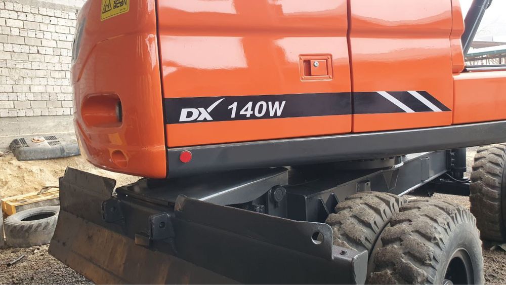 Экскаватор 140 с гидромолотом