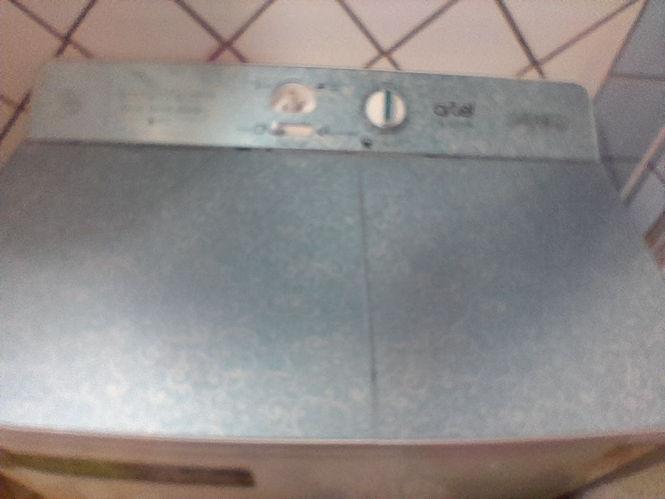 Полуавтомат Artel TG 101, 10 кг. Стиральная машина