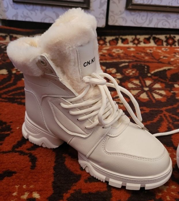 Продам новую,зимнюю обувь