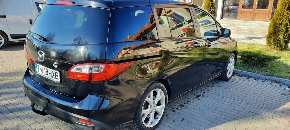 Vând Mazda noastră de Familie   ruleza excelent 7locuri  6 viteze etc.