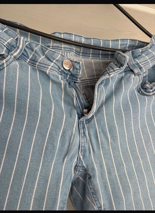 Blugi elastici de dama cu dungi