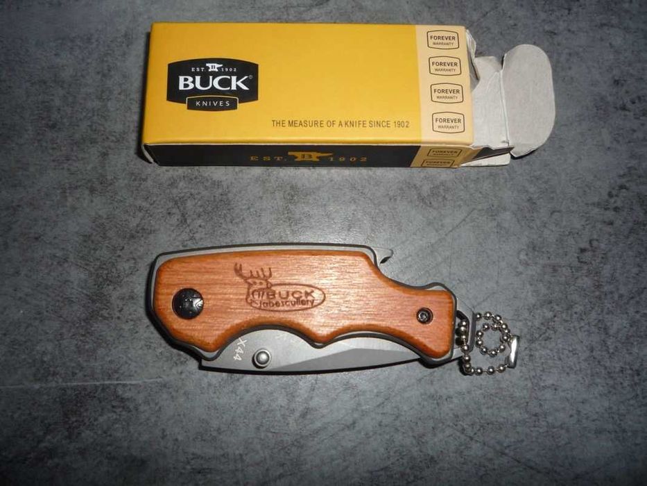 Briceag USA Buck x44, multifunctional, Maner lemn, desfacator bere etc