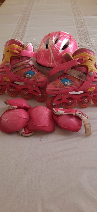 Роликовые коньки