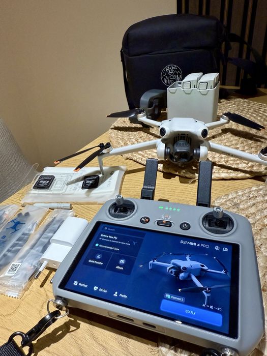 Drona DJI MINI 4 pro Fly More Combo noua , casco 8/2026