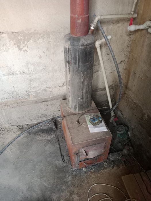 Көмірмен жылытатын үй пеші (Угольная печь )