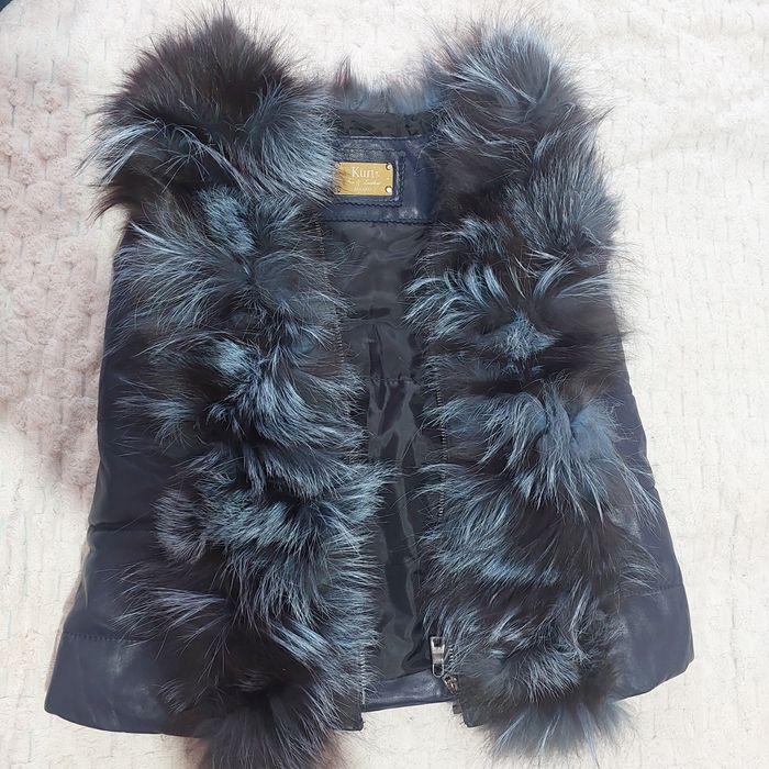 Безрукавку на девочку