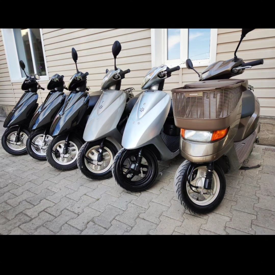 Honda dio. Suzuki