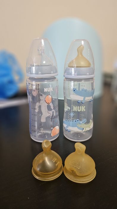 2 бр. големи шишета на Nuk + 2 резервни биберона каучук