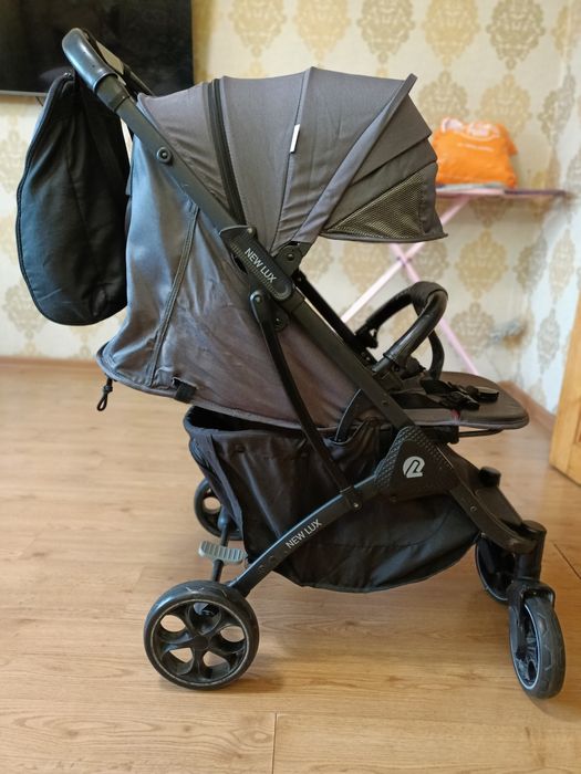 Продам прогулочную коляску NEW LUX .