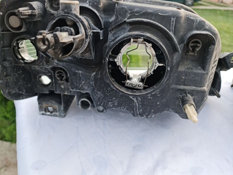 Faruri logan originale Elba (faza 1 ) și lampă spate