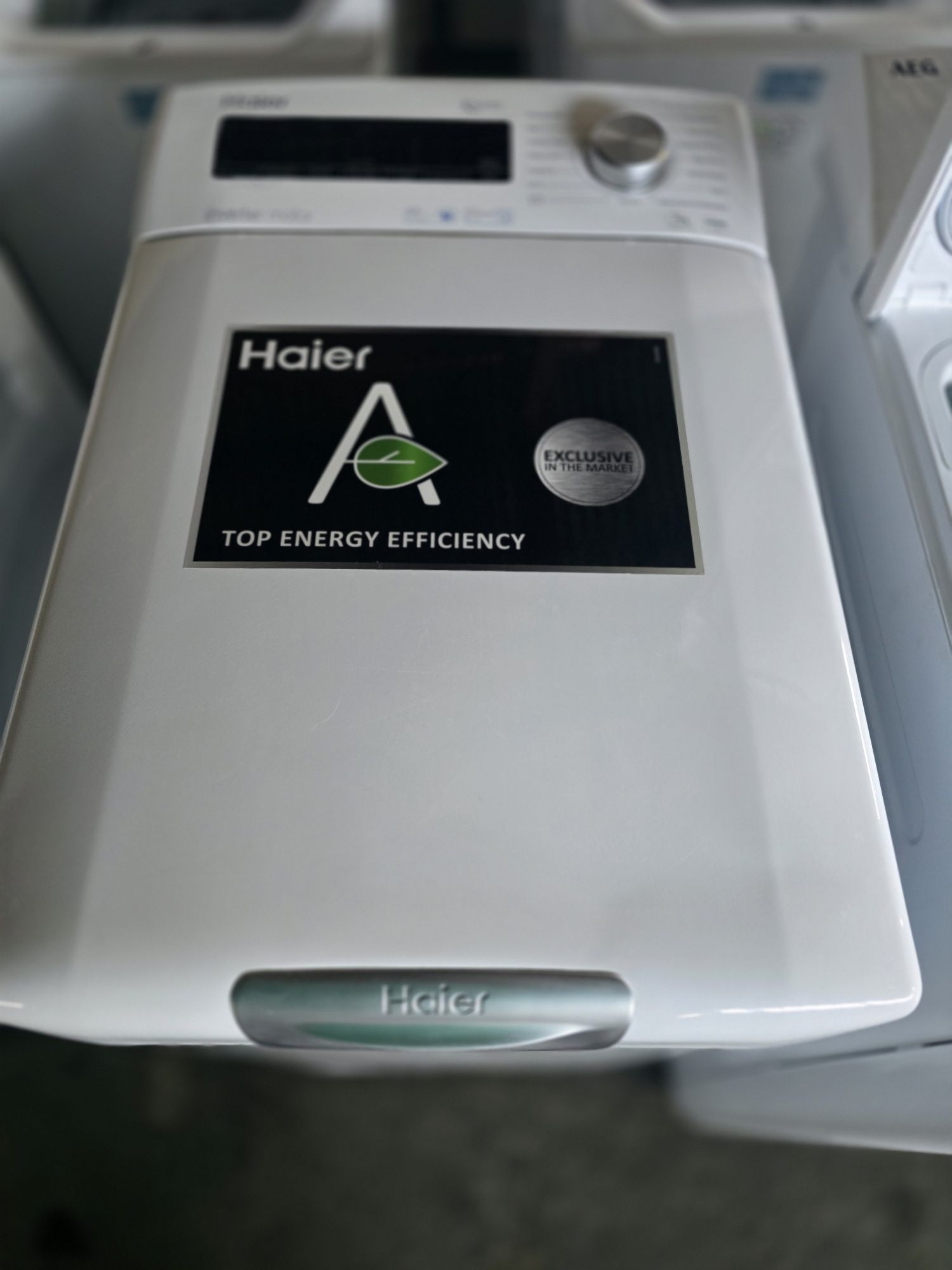 Нова инверторна пералня с пара,с горно зареждане Haier 7 кг